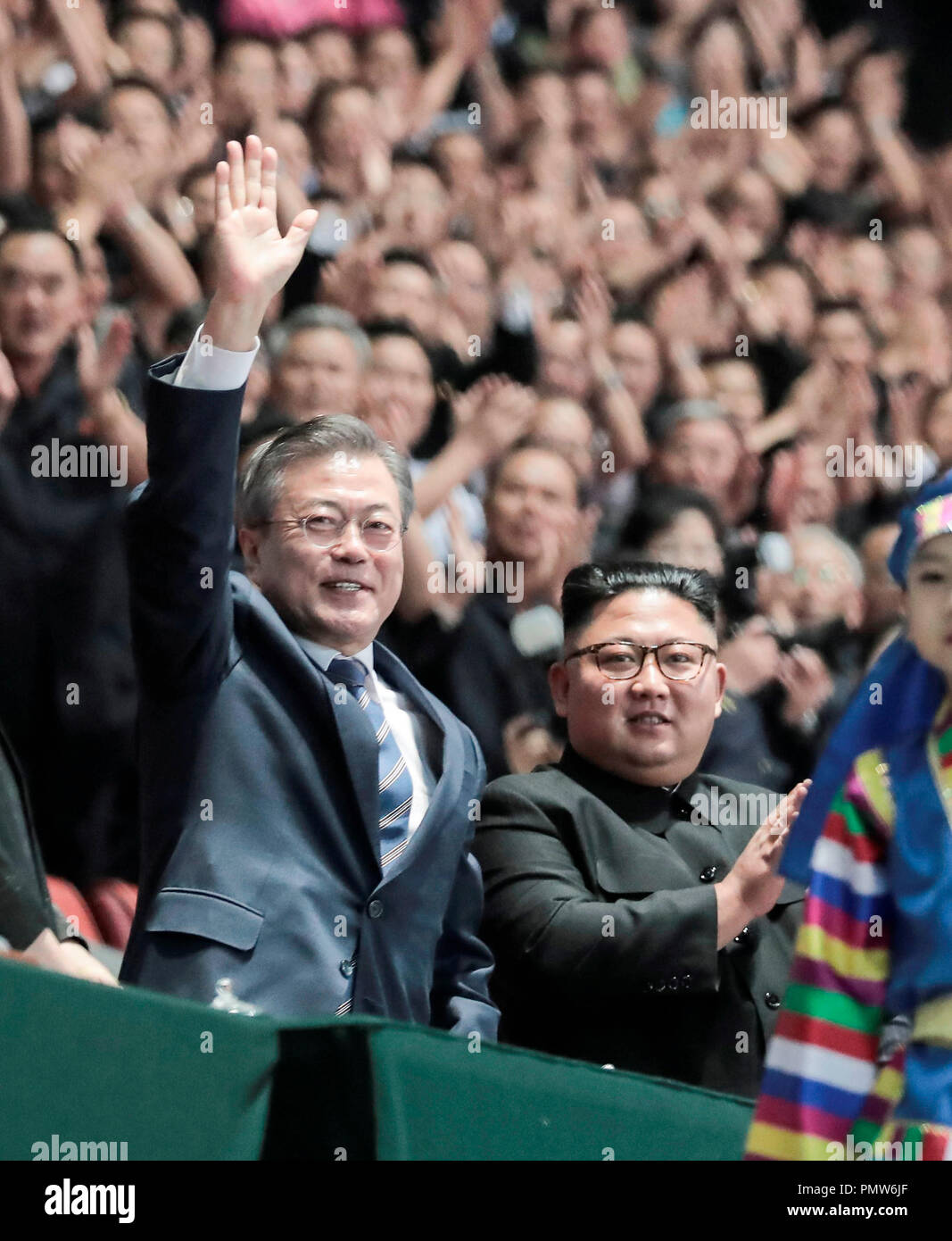 https://c8.alamy.com/comp/PMW6JF/inter-korean-summit-sep-19-2018-north-korean-leader-kim-jong-un-and-south-korean-president-moon-jae-in-along-with-their-wives-wave-to-north-koreans-cheering-before-watching-the-large-scale-gymnastic-and-artistic-show-titled-the-glorious-country-at-the-may-day-stadium-in-pyongyang-north-korea-editorial-use-only-credit-pyeongyang-press-corpspoolafloalamy-live-news-PMW6JF.jpg