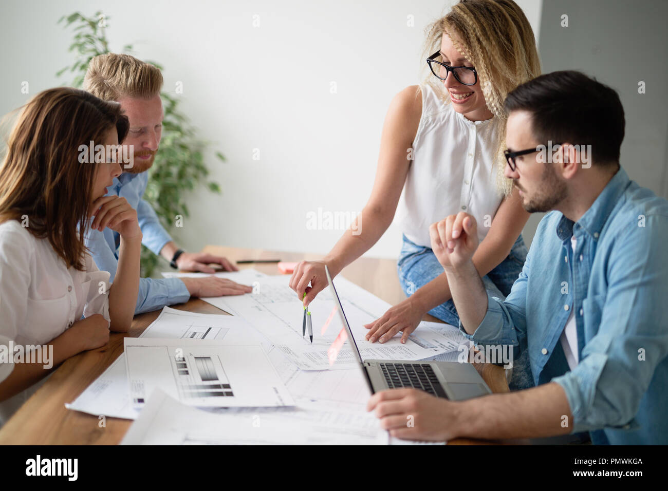 Designers working on new project in modern office Stock Photo