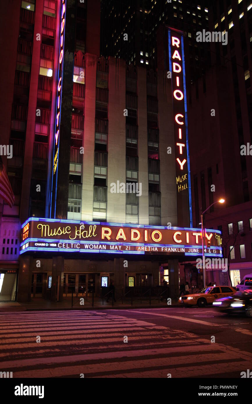 NEW YORK, USA - CIRCA MARCH 2014 - The radio City Music hall at night, featuring Aretha Franklin concerts with led lights. Vertical shot. Stock Photo