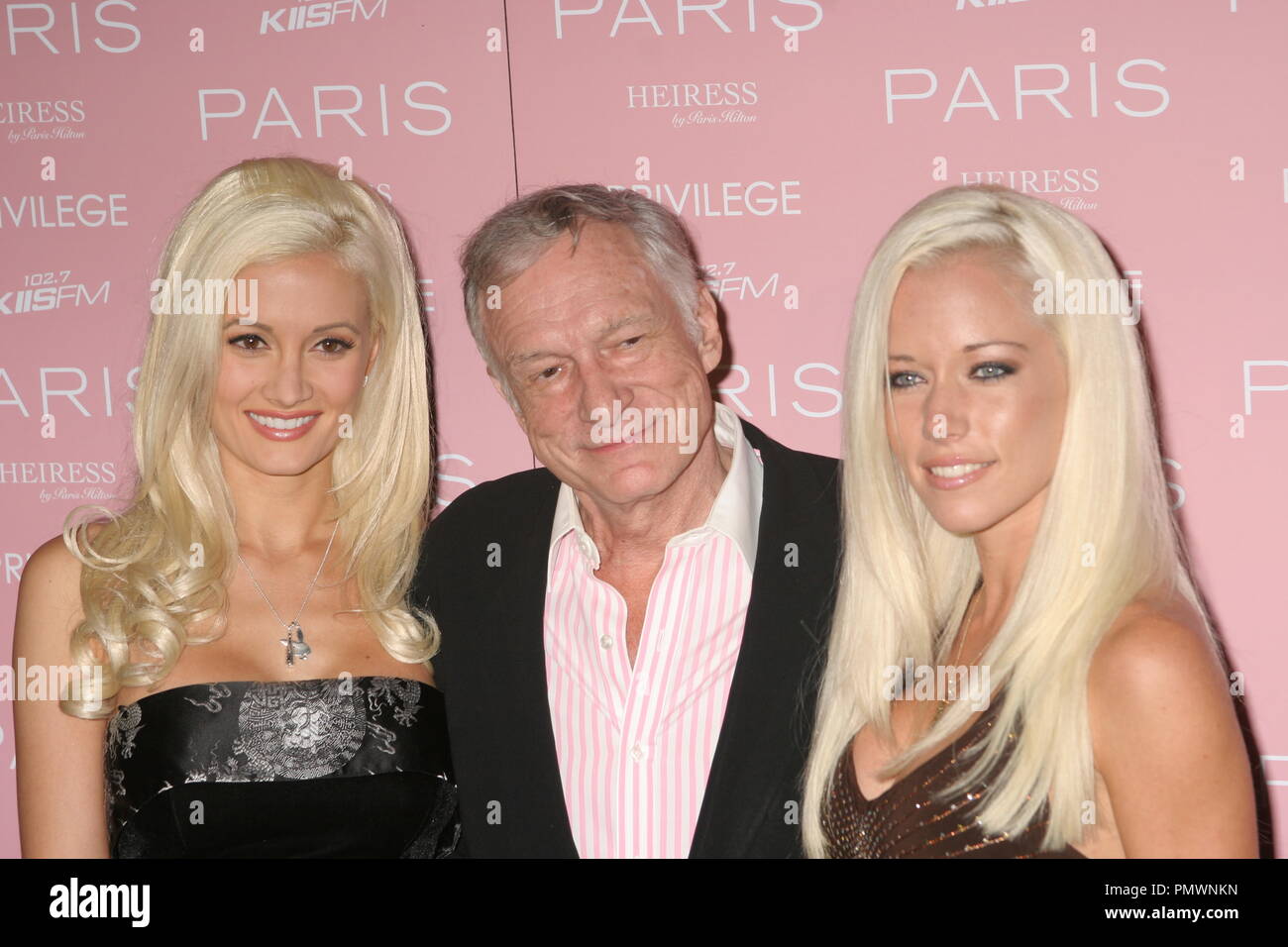 Playboy founder Hugh Hefner and his dates, Holly Madison (left) and Kendra Wilkinson 08/18/06 'Paris Hilton Album Release Party' @Privilege, West Hollywood Photo by Ima Kuroda/HNW / PictureLux File Reference # 32012 014HNW  For Editorial Use Only -  All Rights Reserved Stock Photo