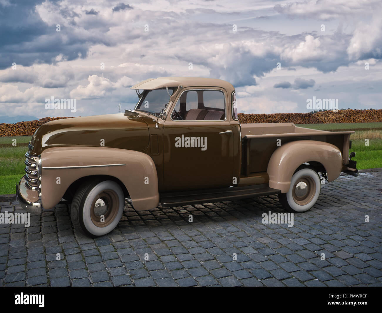 Classic pick-up oldtimer in light brown and dark brown on cobblestones Stock Photo