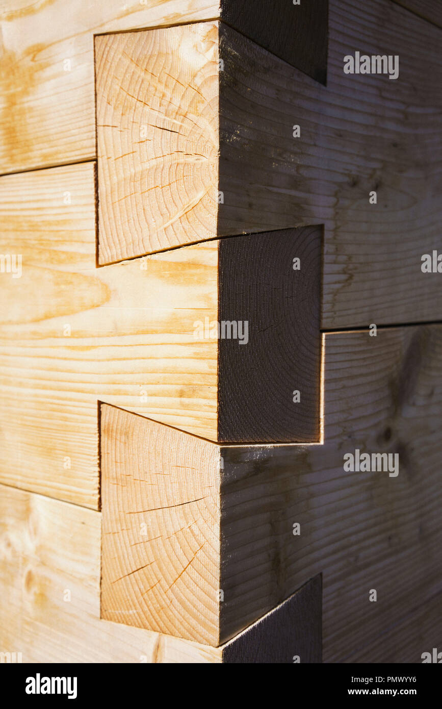 Close up of dovetail wooden corner of built structure Stock Photo