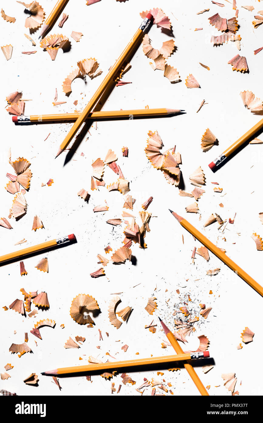 Pencils and shavings on white background Stock Photo