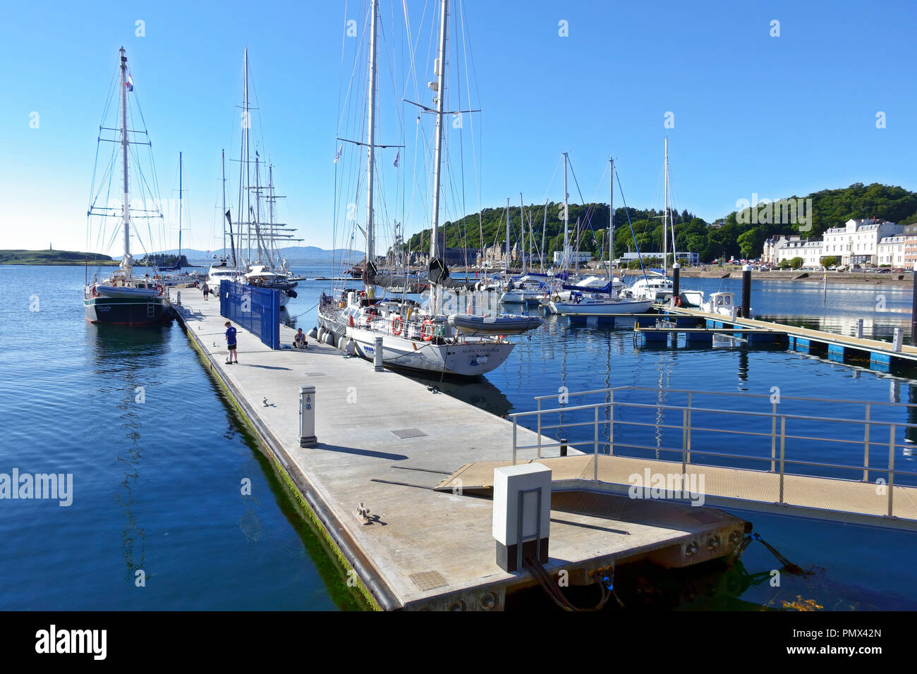 Yachts moored at the North Pier pontoons in Oban, Argyll & Bute, Scotland Stock Photo