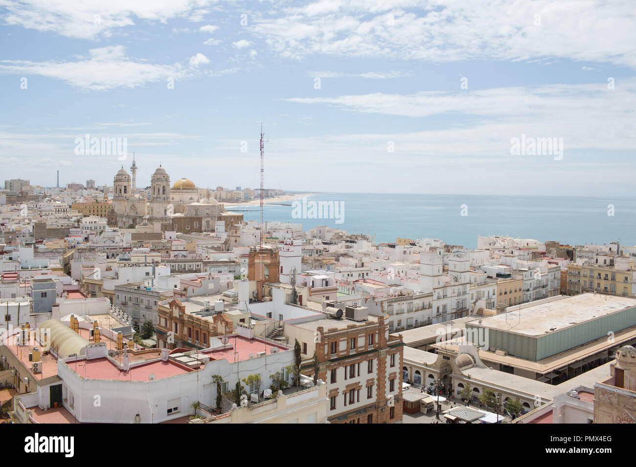 A view looking down on the rooftops of the city of Cadiz in Spain from the Tavira Tower (camera obscura) with the coastline and sea in the distance Stock Photo