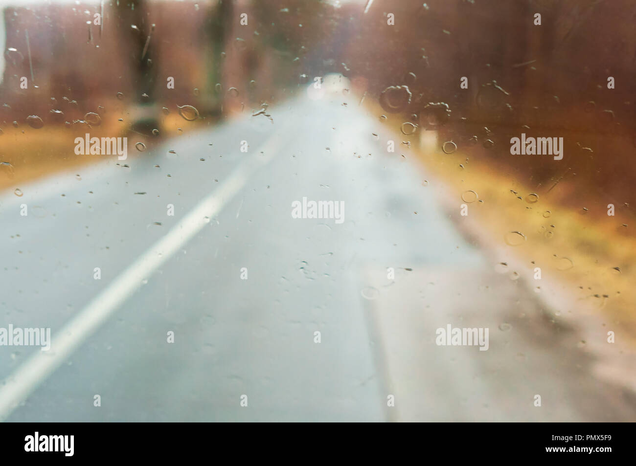Car through rainy window hi-res stock photography and images - Alamy