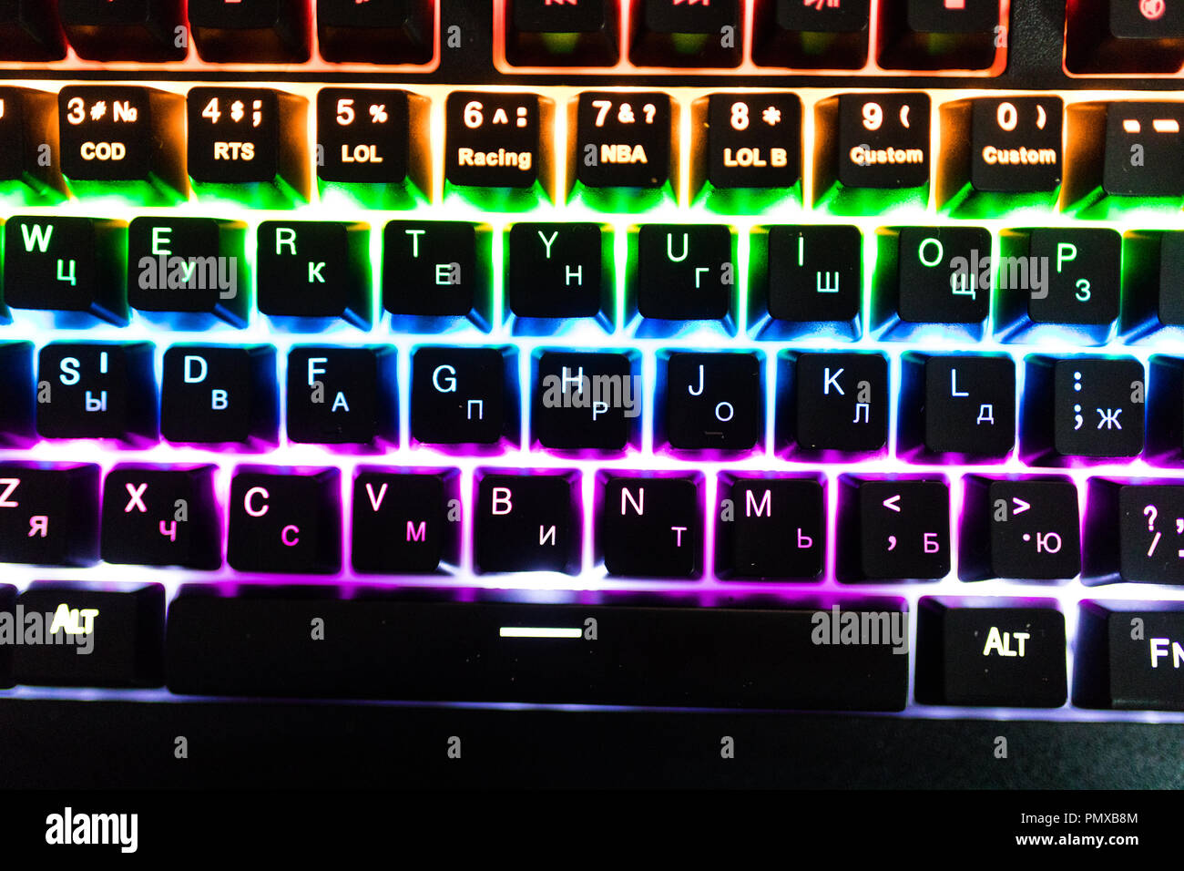 Gamer keyboard with colorful lights, modern laptop computer Stock Photo -  Alamy