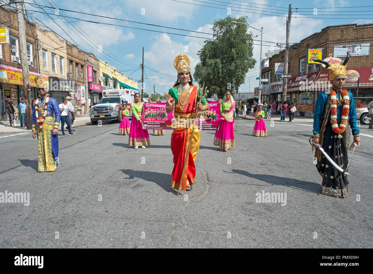 Men and women marchers in great costumes  including three dressed as deitiies at the 2018 Madrassi Parade in Richmond Hill, Queens, New York. Stock Photo
