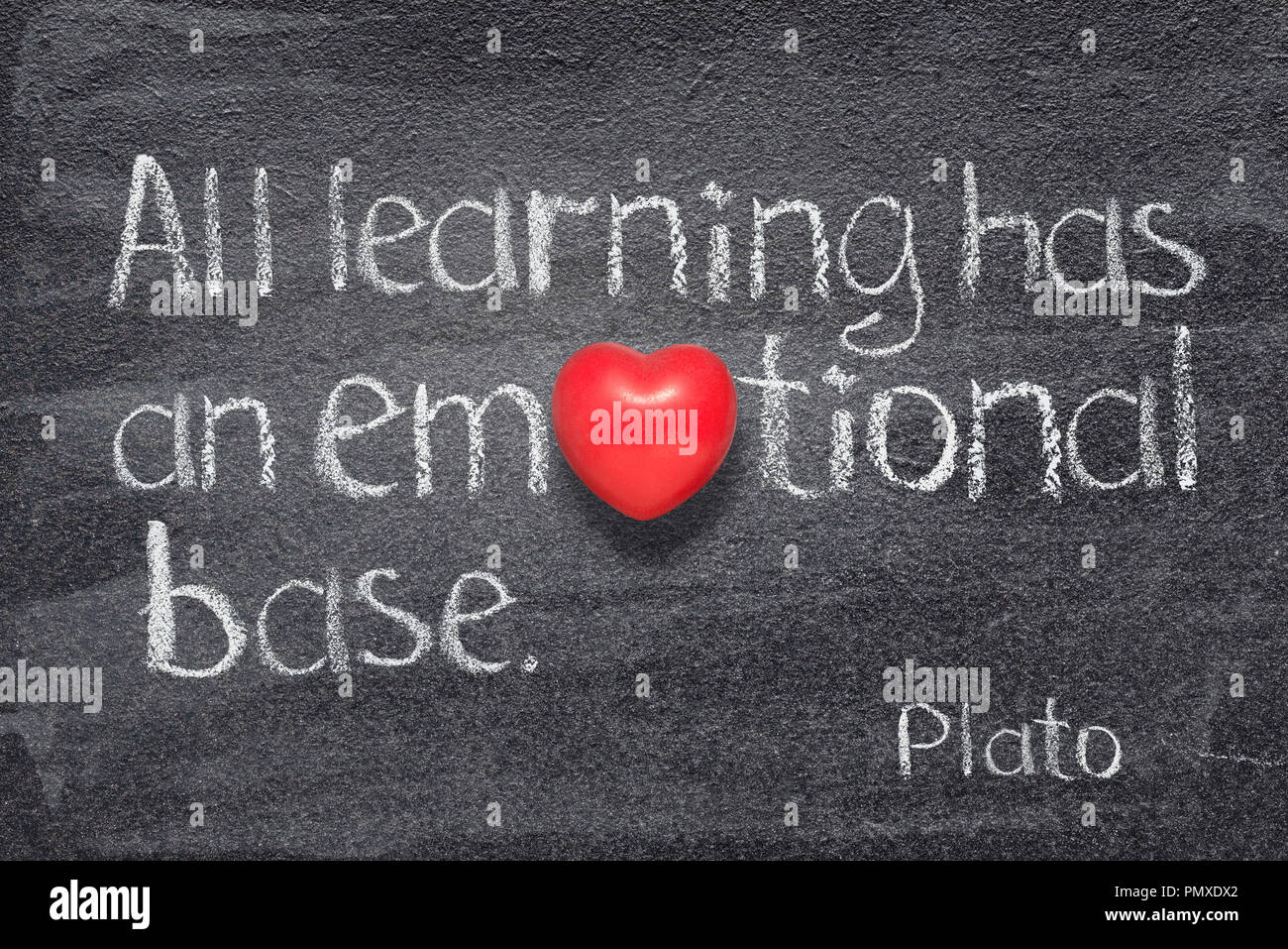 All learning has an emotional base - quote of ancient Greek philosopher Plato written on chalkboard with red heart instead of O Stock Photo
