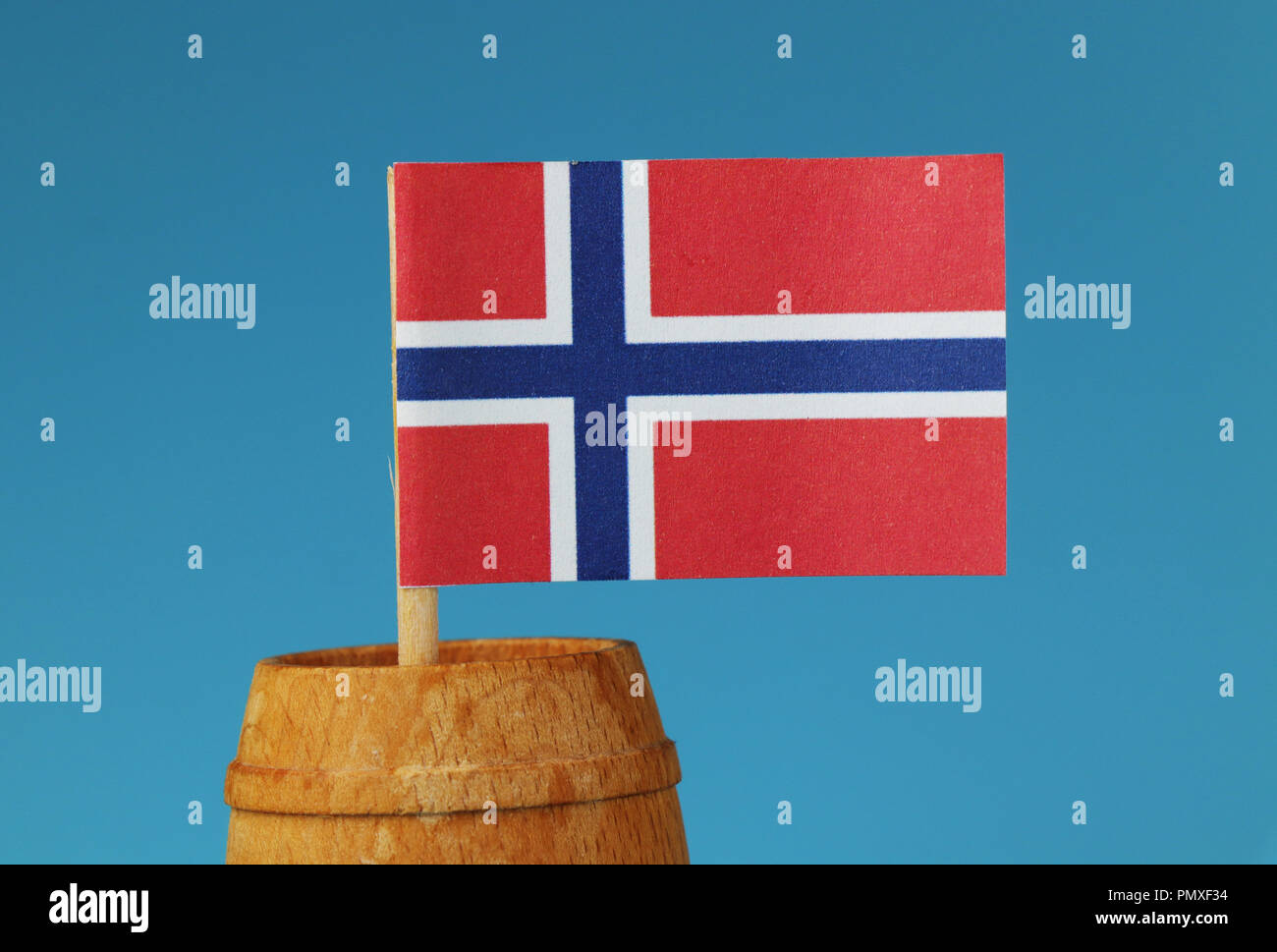 A National Flag Of Norway On Wooden Stick In Wooden Barrel Blue Background Stock Photo Alamy