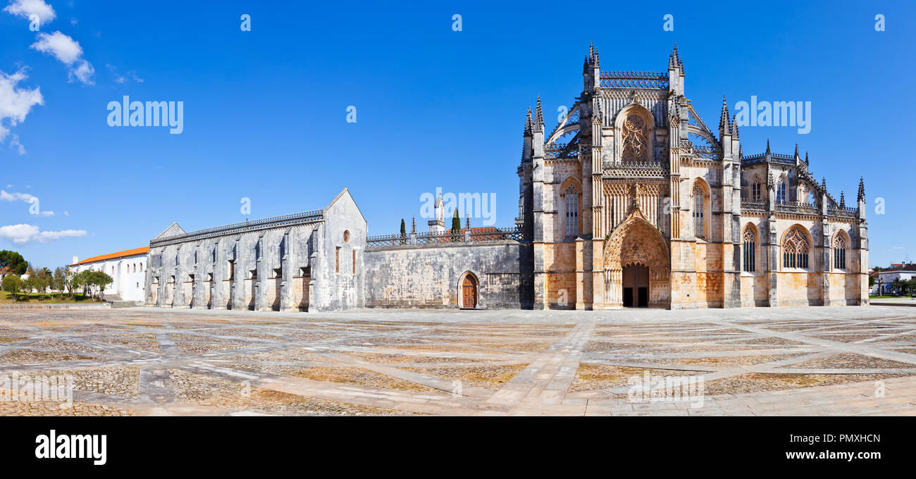 Batalha, Portugal. Monastery of Batalha aka Santa Maria da Vitoria Abbey. Facade with Portal in Gothic and Manuelino aka Manueline style Stock Photo