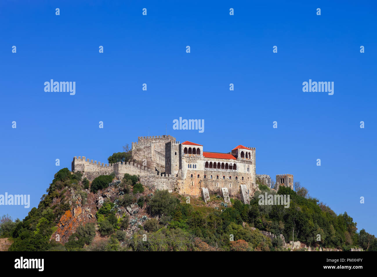 Medieval Leiria Castle built on top of a hill with a view over the Gothic Palatial Residence or Pacos Novos. A Templar Knights Castle. Portugal Stock Photo
