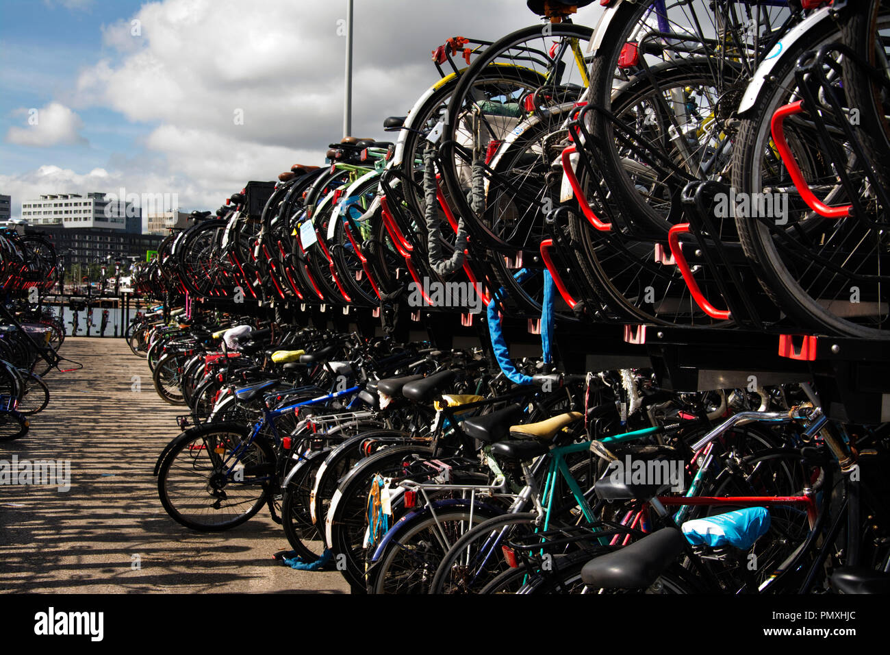 Holland (The Netherlands), Amsterdam, bicycle racks near the railway station Stock Photo
