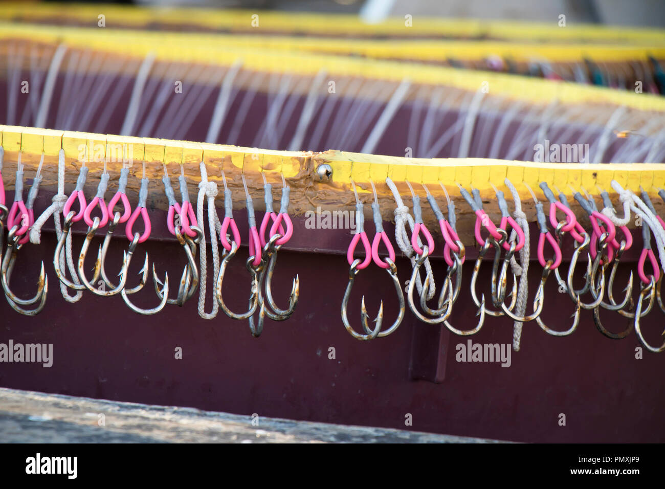 Long line fishing gear, containers with hooks inside a boat, equipment for  traditional commercial fishing technique in Adriatic sea Stock Photo - Alamy
