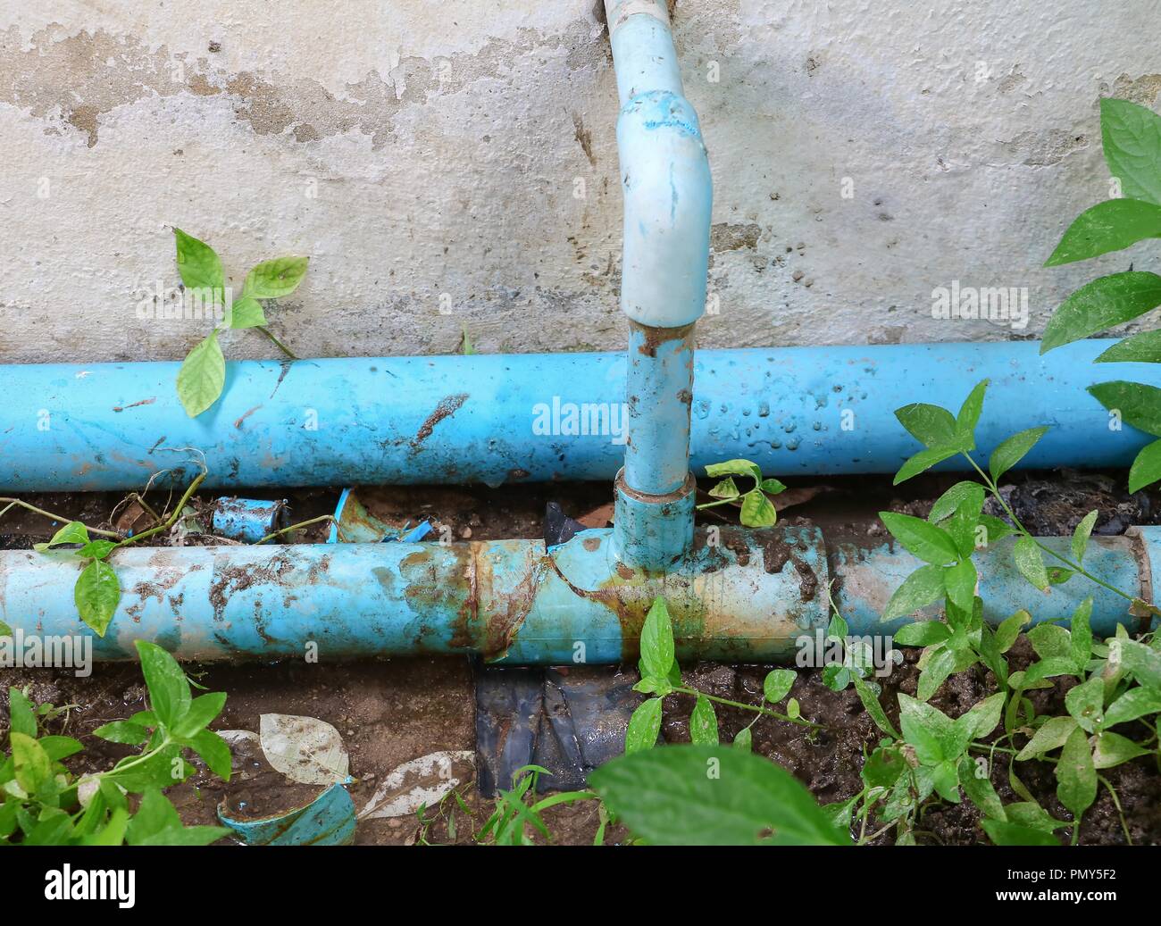 water valve broken plumbing tube and leak at wait repair plumber Stock