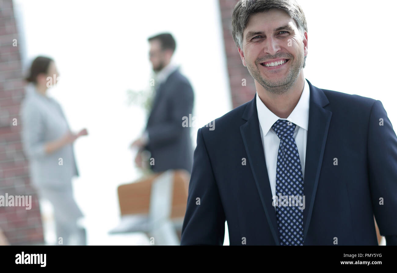 Smiling middle aged business man Stock Photo - Alamy