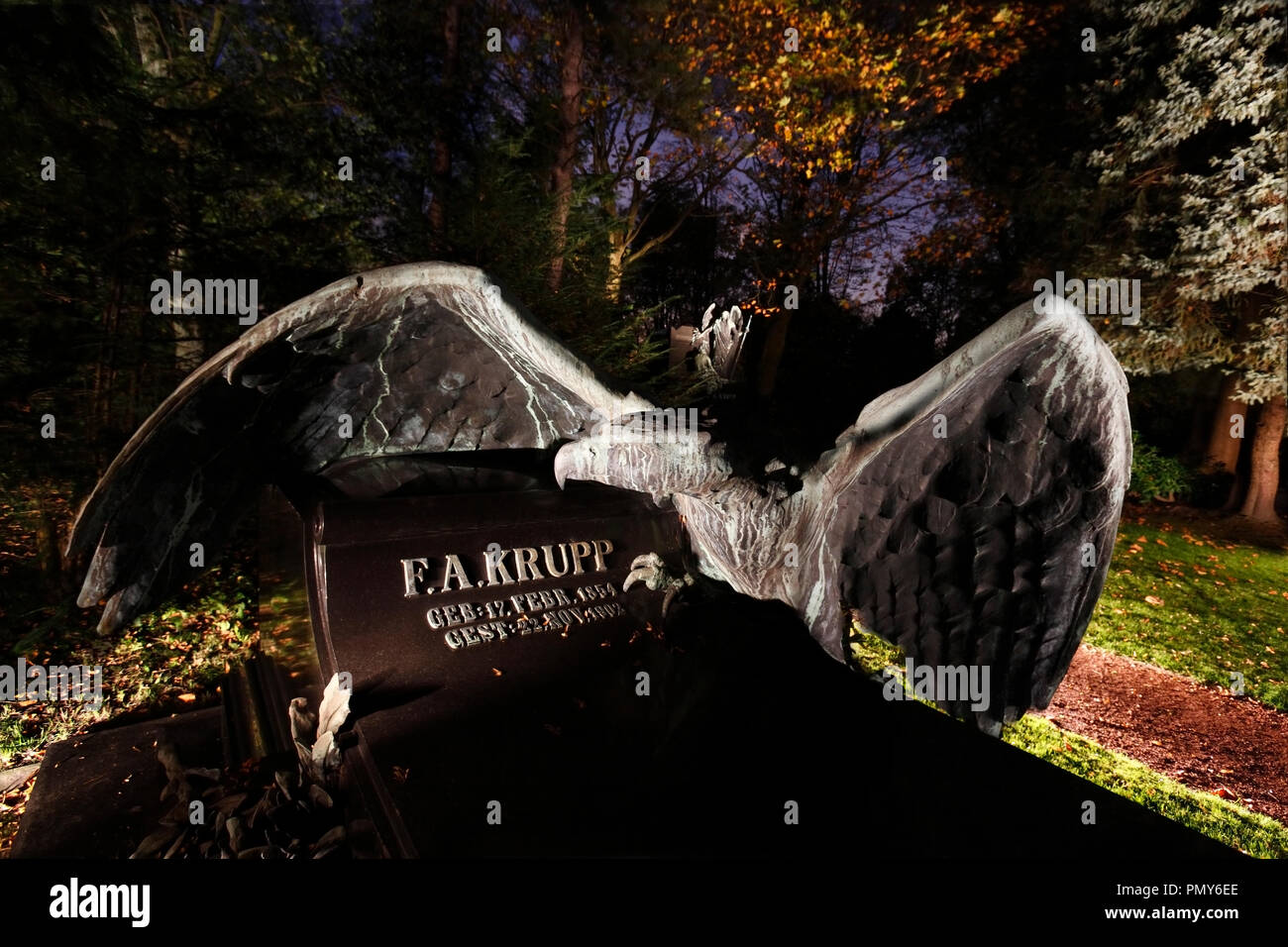 At the municipal cemetery Essen-Bredeney there is a separate area where the graves of the Krupp family are located. The tomb of Friedrich Alfred Krupp, is made of dark granite and is adorned by a huge bronze eagle. Stock Photo
