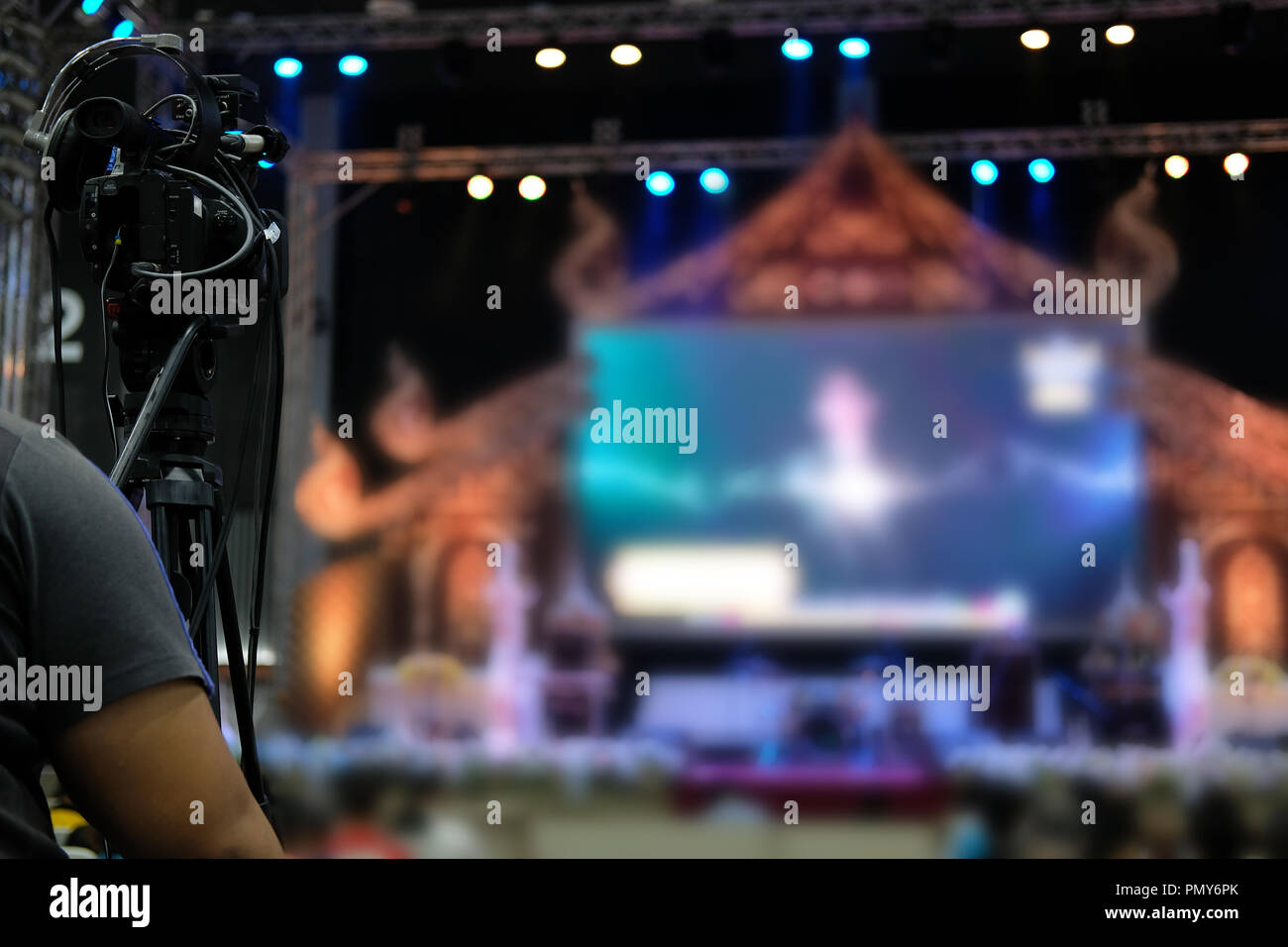 professional video production camera recording live event on stage
