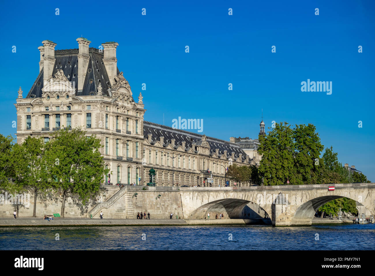 The Louvre, Pavillon de Flore, and Pont Royal bridge over the river Seine, Paris, France Stock Photo