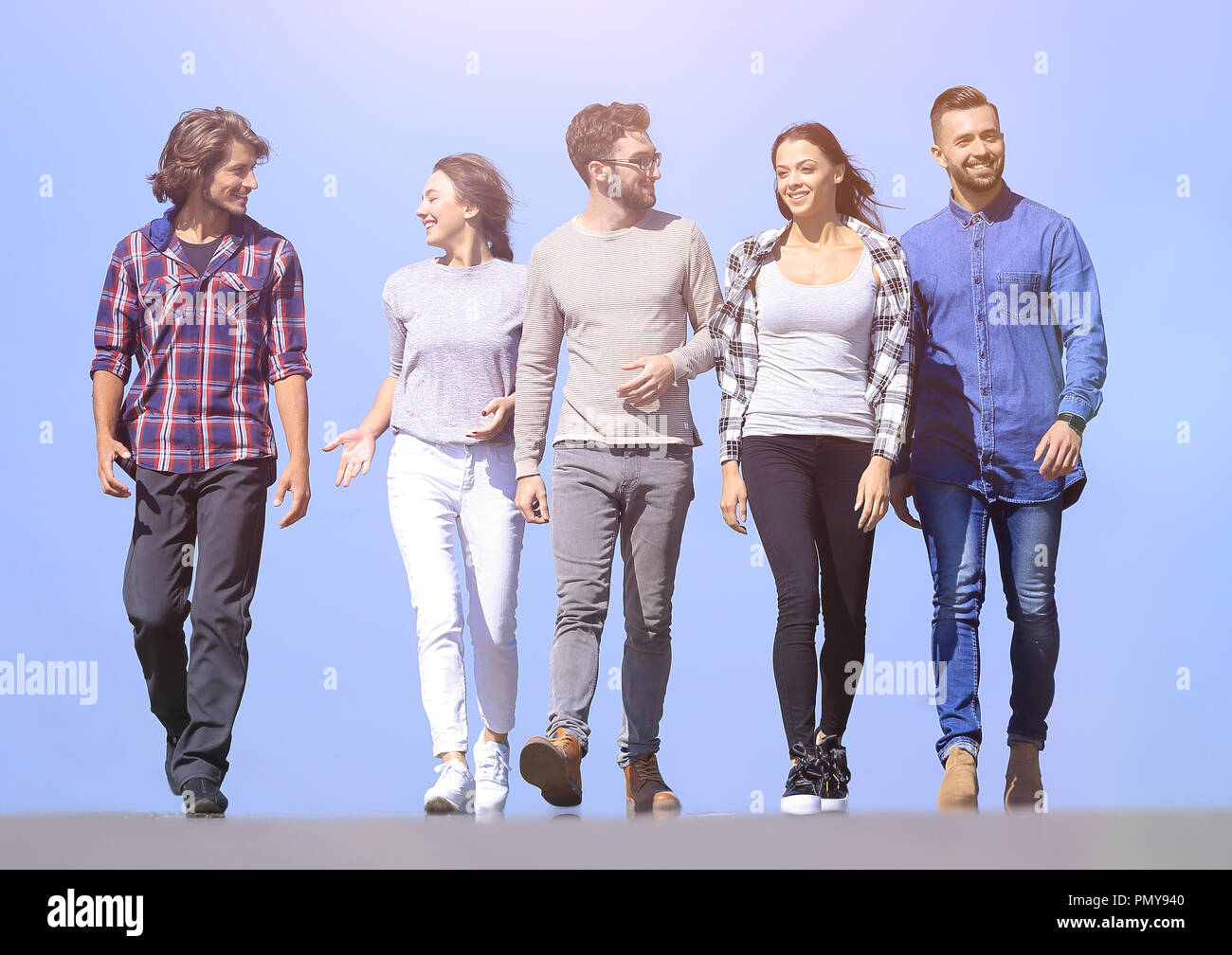 Young adults group diverse walking hi-res stock photography and images ...