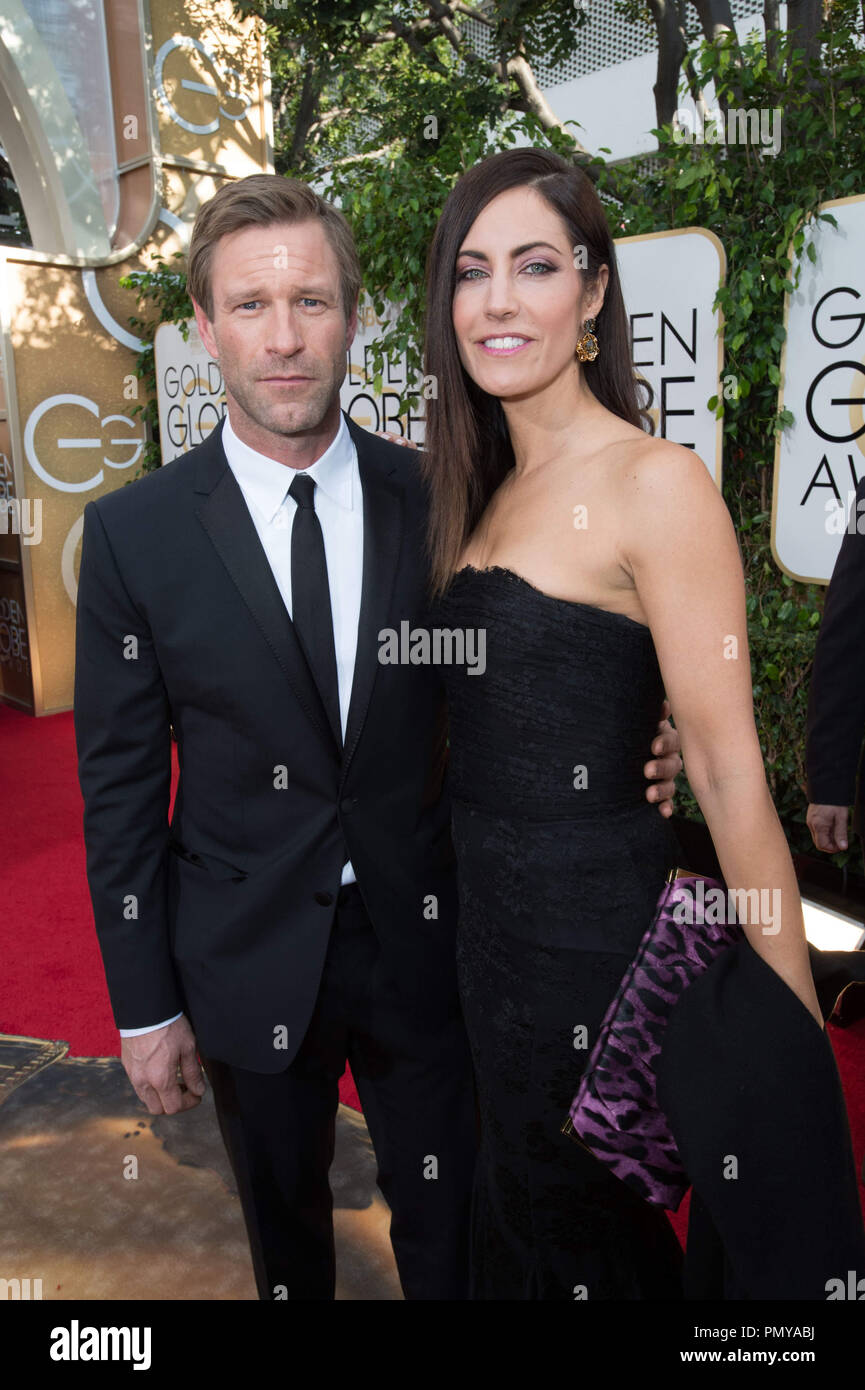 Aaron Eckhart and attend the 71st Annual Golden Globes Awards at the