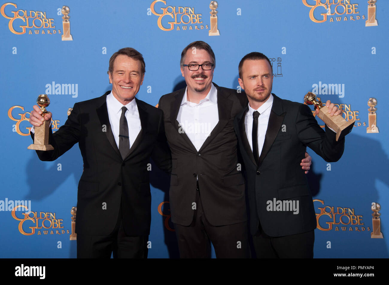 For BEST TELEVISION SERIES – DRAMA, the Golden Globe is awarded to “BREAKING BAD” (AMC), produced by Sony Pictures Television. Bryan Cranston, Vince Gilligan and Aaron Paul pose with the award backstage in the press room at the 71st Annual Golden Globe Awards at the Beverly Hilton in Beverly Hills, CA on Sunday, January 12, 2014.  File Reference # 32222 376JRC  For Editorial Use Only -  All Rights Reserved Stock Photo