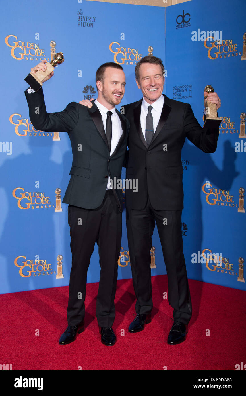 For BEST TELEVISION SERIES – DRAMA, the Golden Globe is awarded to “BREAKING BAD” (AMC), produced by Sony Pictures Television. Aaron Paul and Bryan Cranston pose with the award backstage in the press room at the 71st Annual Golden Globe Awards at the Beverly Hilton in Beverly Hills, CA on Sunday, January 12, 2014.  File Reference # 32222 378JRC  For Editorial Use Only -  All Rights Reserved Stock Photo