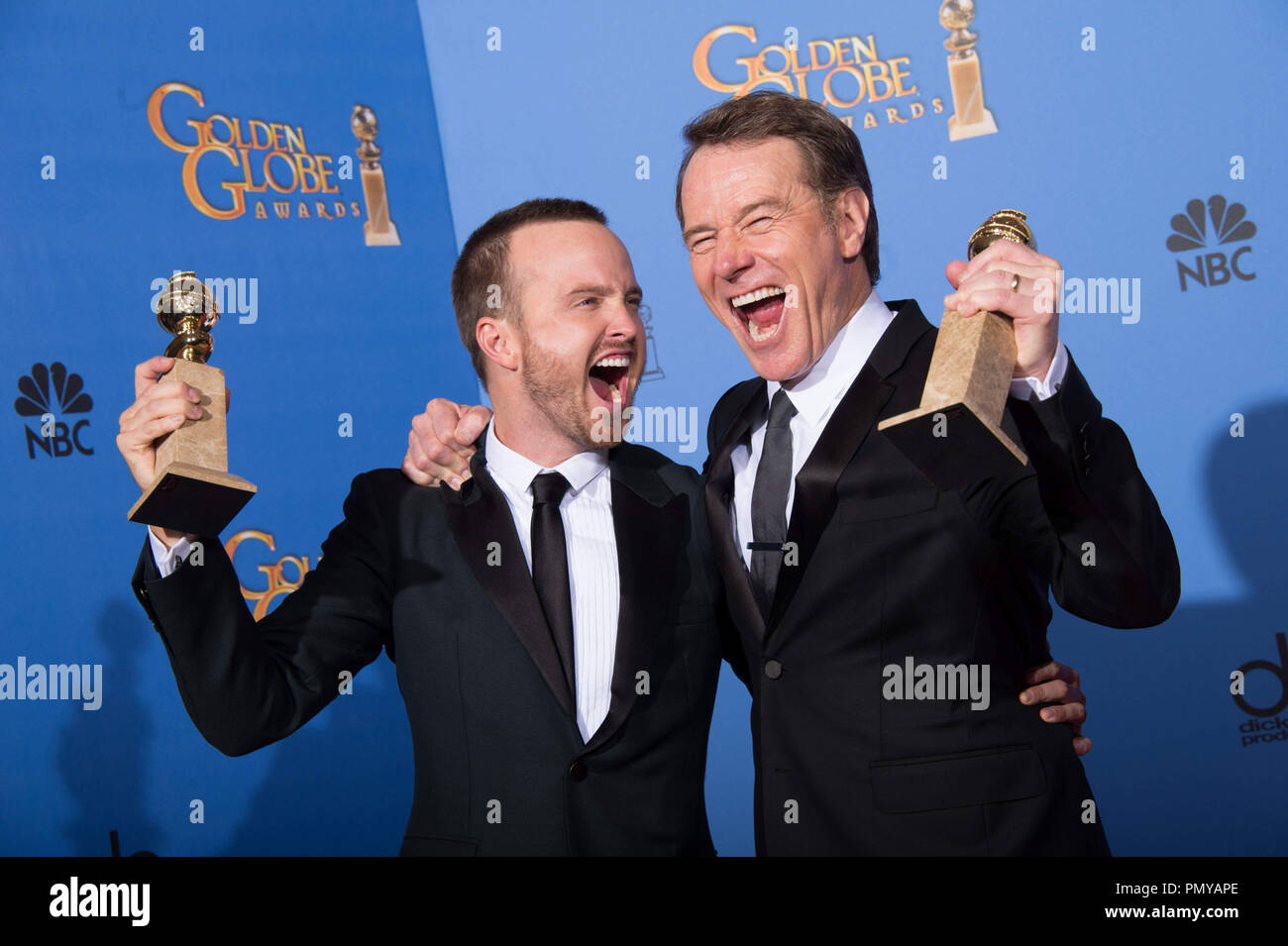 For BEST TELEVISION SERIES – DRAMA, the Golden Globe is awarded to “BREAKING BAD” (AMC), produced by Sony Pictures Television. Aaron Paul and Bryan Cranston pose with the award backstage in the press room at the 71st Annual Golden Globe Awards at the Beverly Hilton in Beverly Hills, CA on Sunday, January 12, 2014.  File Reference # 32222 381JRC  For Editorial Use Only -  All Rights Reserved Stock Photo