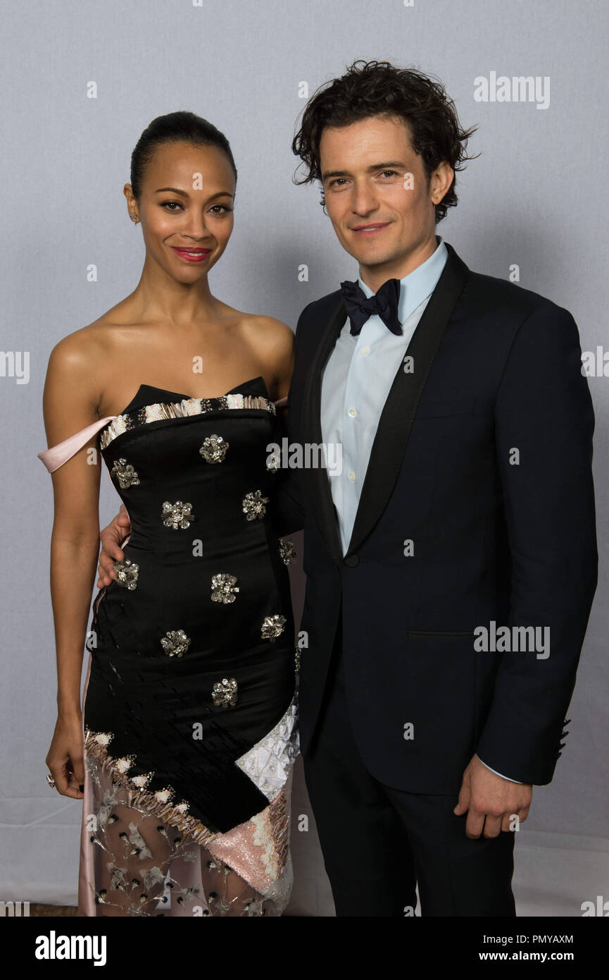 Zoe Saldana and Orlando Bloom pose backstage in the press room at the 71st Annual Golden Globe Awards at the Beverly Hilton in Beverly Hills, CA on Sunday, January 12, 2014.  File Reference # 32222 471JRC  For Editorial Use Only -  All Rights Reserved Stock Photo