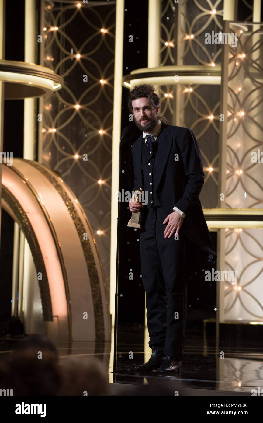 The Golden Globe is awarded to Alex Ebert for BEST ORIGINAL SCORE – MOTION PICTURE for “ALL IS LOST” at the 71st Annual Golden Globe Awards at the Beverly Hilton in Beverly Hills, CA on Sunday, January 12, 2014.  File Reference # 32222 507JRC  For Editorial Use Only -  All Rights Reserved Stock Photo