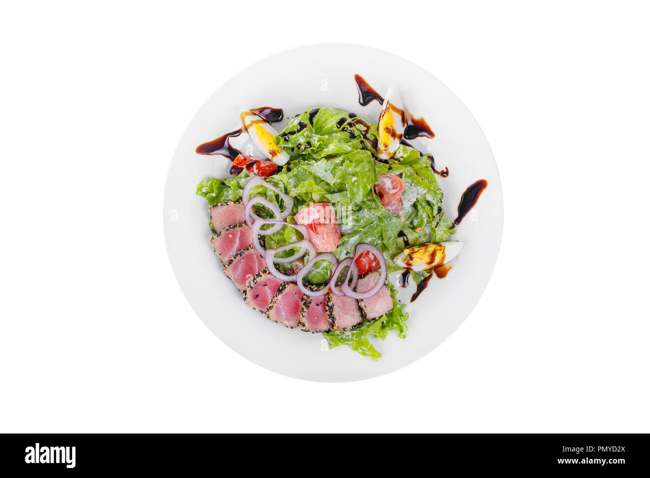 Salad with roast beef with onion, boiled eggs, tomatoes and balsamic