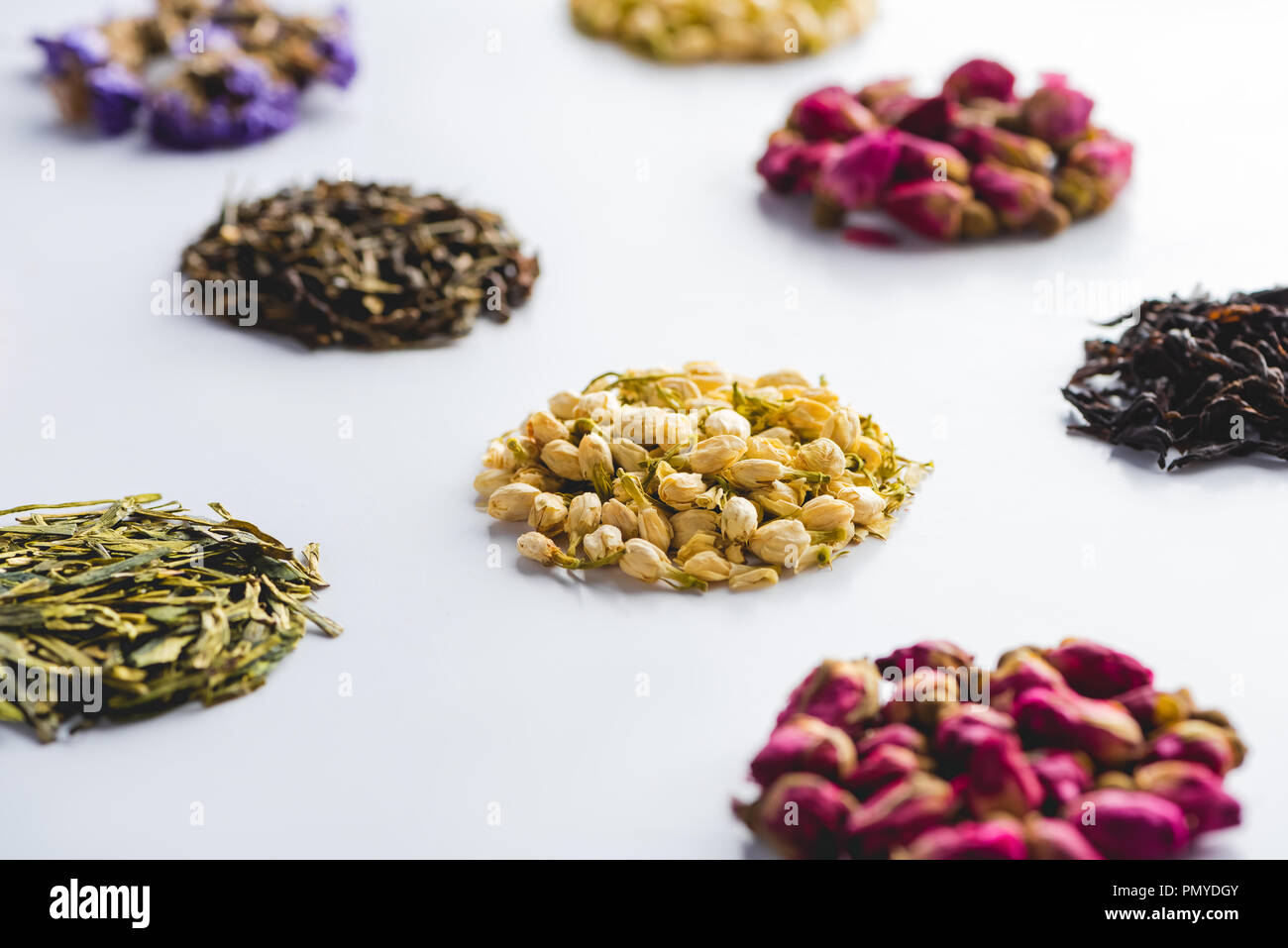 collection of dried herbal healthy tea on white surface Stock Photo - Alamy