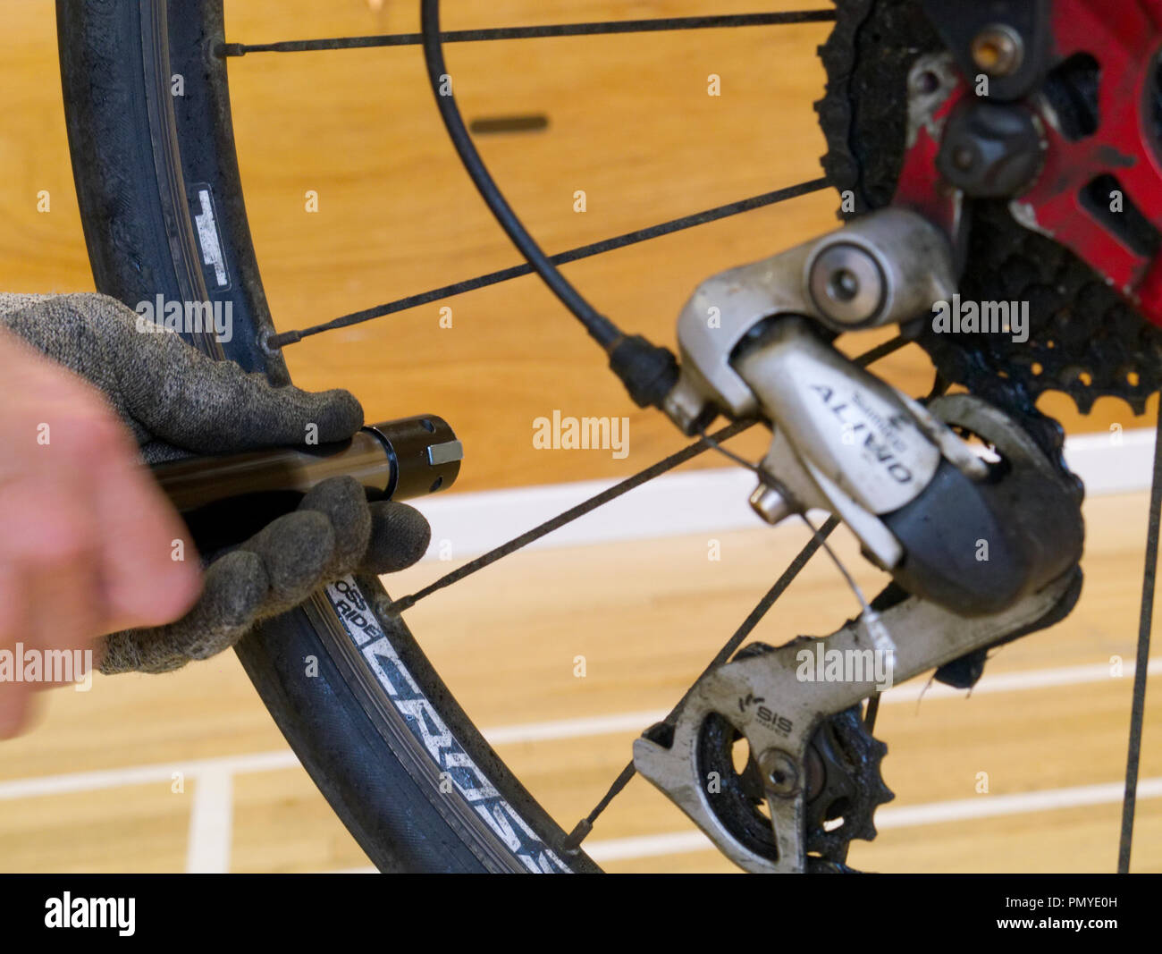 Using a pump to inflate cycle tyre Stock Photo Alamy