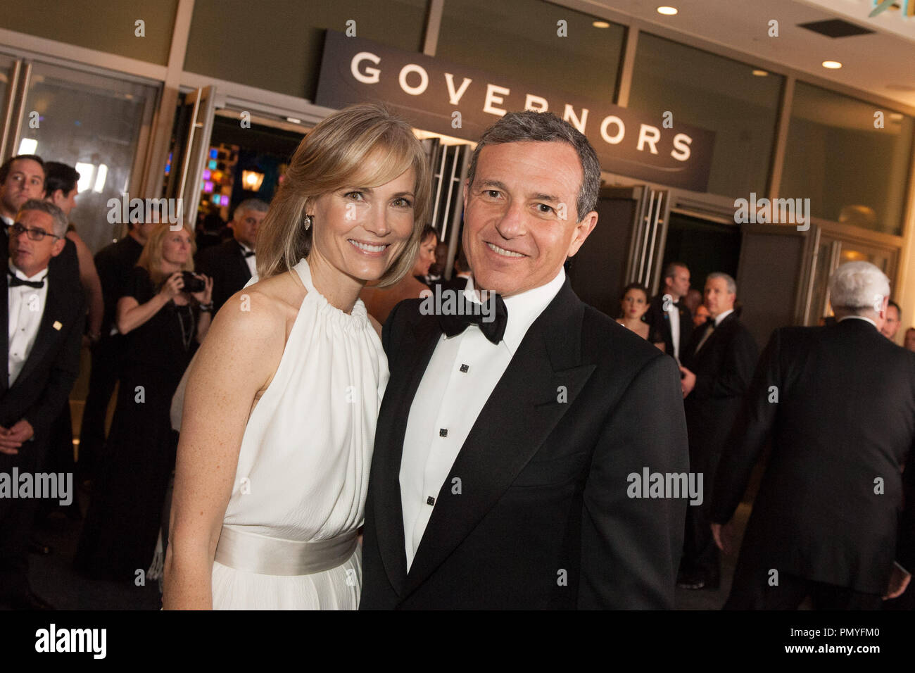 Bog Iger, chief executive officer of The Walt Disney Company and wife Willow Bay attend the Governor’s Ball after the ABC Telecast of The Oscars® from the Dolby® Theatre in Hollywood, CA Sunday, March 2, 2014.  File Reference # 32268 440  For Editorial Use Only -  All Rights Reserved Stock Photo