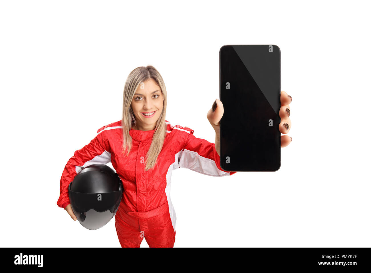 Woman racer holding a helmet and a mobile phone isolated on white background Stock Photo