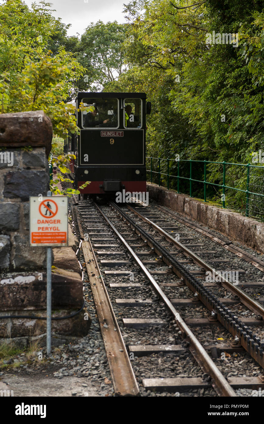 Snowdon Mountain Railway engine Hunslet descending to the station in Llanberis Stock Photo