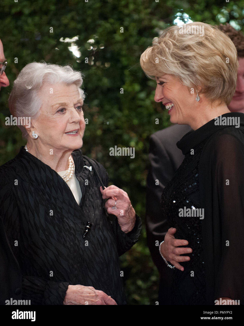 Honorary Award recipient Angela Lansbury  (left) and actress Emma Thompson attend the 5th Annual Governors Awards at The Ray Dolby Ballroom at Hollywood & Highland Center® in Hollywood, CA, on Saturday, November 16, 2013.  File Reference # 32184 029  For Editorial Use Only -  All Rights Reserved Stock Photo