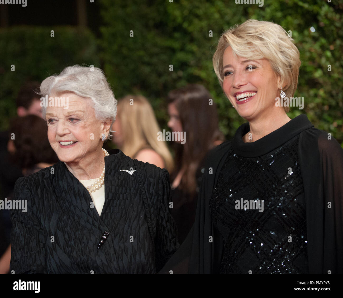Honorary Award recipient Angela Lansbury  (left) and actress Emma Thompson attend the 5th Annual Governors Awards at The Ray Dolby Ballroom at Hollywood & Highland Center® in Hollywood, CA, on Saturday, November 16, 2013.  File Reference # 32184 030  For Editorial Use Only -  All Rights Reserved Stock Photo