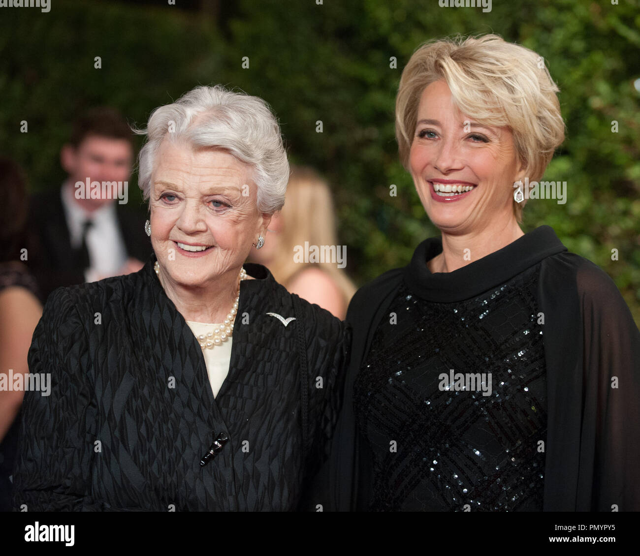 Honorary Award recipient Angela Lansbury  (left) and actress Emma Thompson attend the 5th Annual Governors Awards at The Ray Dolby Ballroom at Hollywood & Highland Center® in Hollywood, CA, on Saturday, November 16, 2013.  File Reference # 32184 031  For Editorial Use Only -  All Rights Reserved Stock Photo