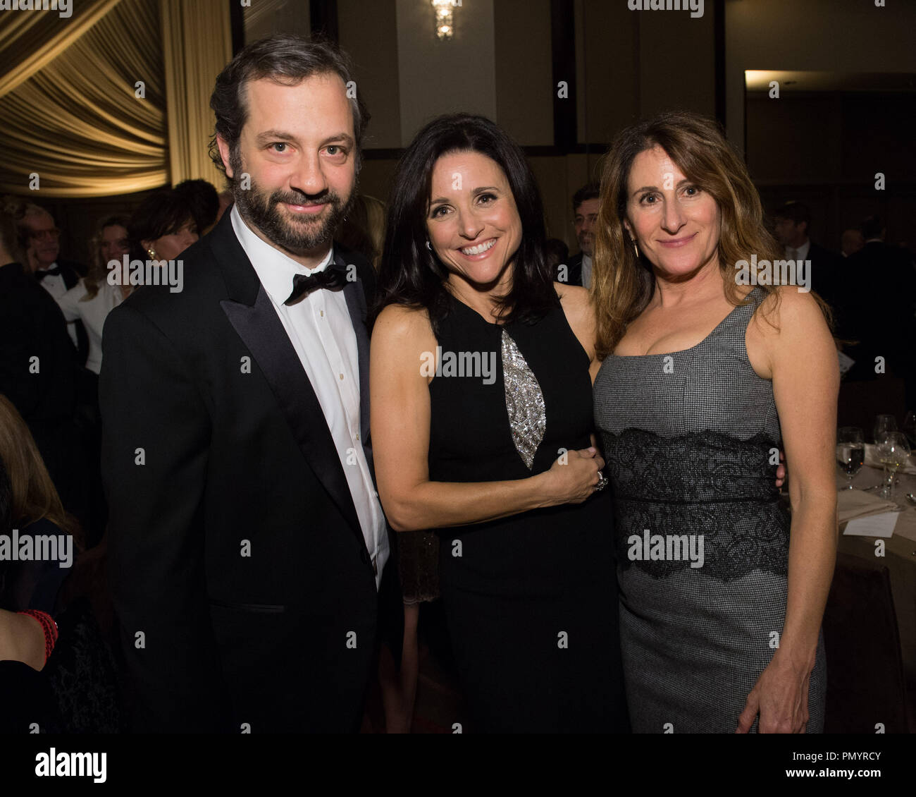 Director Judd Apatow (left), actress Julia Louis-Dreyfus (center) and director Nicole Holofcener attend the 5th Annual Governors Awards at The Ray Dolby Ballroom at Hollywood & Highland Center® in Hollywood, CA, on Saturday, November 16, 2013.  File Reference # 32184_112  For Editorial Use Only -  All Rights Reserved Stock Photo