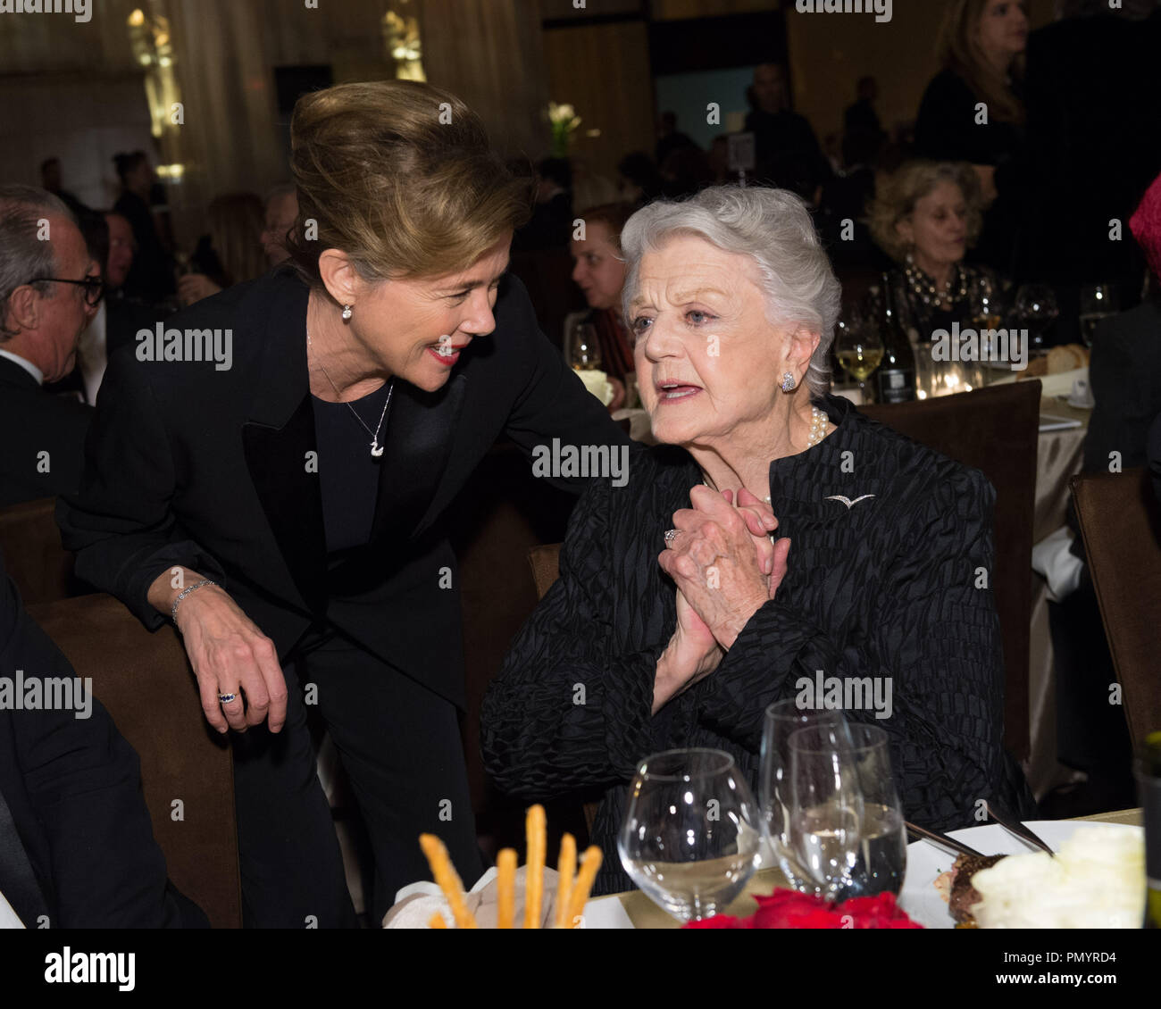 Actress Annette Benning (left) and Honorary Award recipient Angela Lansbury attend the 5th Annual Governors Awards at The Ray Dolby Ballroom at Hollywood & Highland Center® in Hollywood, CA, on Saturday, November 16, 2013.  File Reference # 32184 113  For Editorial Use Only -  All Rights Reserved Stock Photo