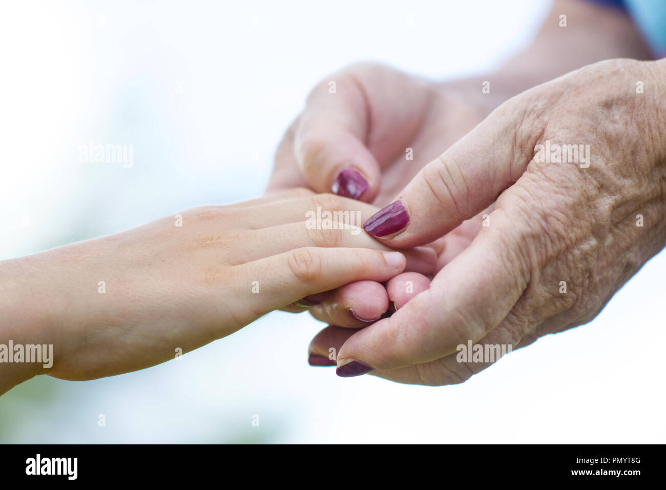 granmother and niece holding hands Stock Photo