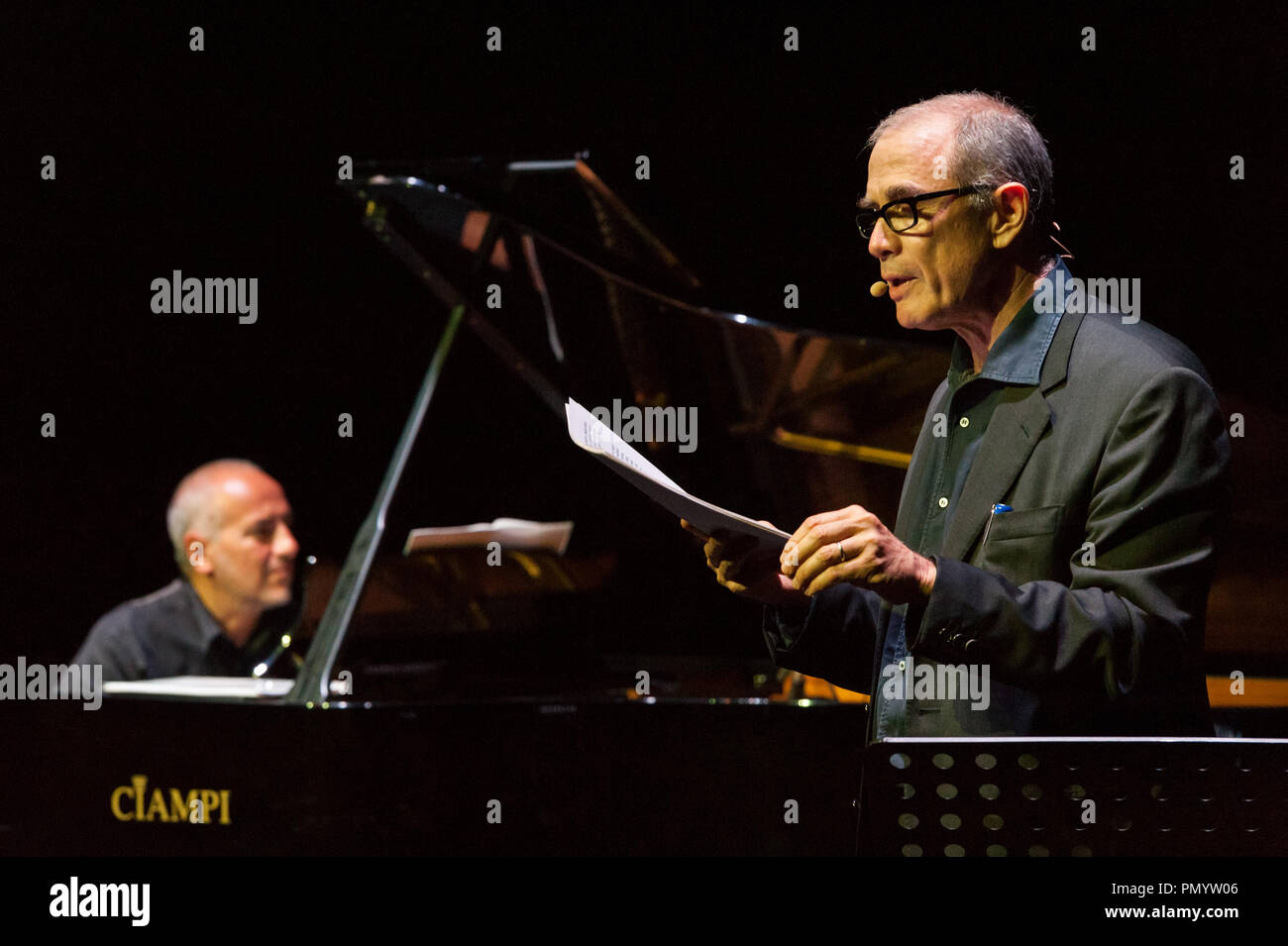 Danilo Rea at the piano and Urbano Barberini, narrator, presented on 18/9/2018 at the Auditorium Parco della Musica in Rome at the Franco-Italian Festival of jazz and improvised music 'Una striscia di Terra Feconda', the pièce by Nello Trocchia (journalist and writer threatened by the Camorra for his own writings), 'The ruins of Hadrian'. Voice narrator Urbano Barberini, who interacted with the improvisations of the pianist Danilo Rea. The pièce tells of an important victory of civil society on business policy, which had planned to build a landfill at the Hadrian's Villa, Unesco site. Urbano B Stock Photo