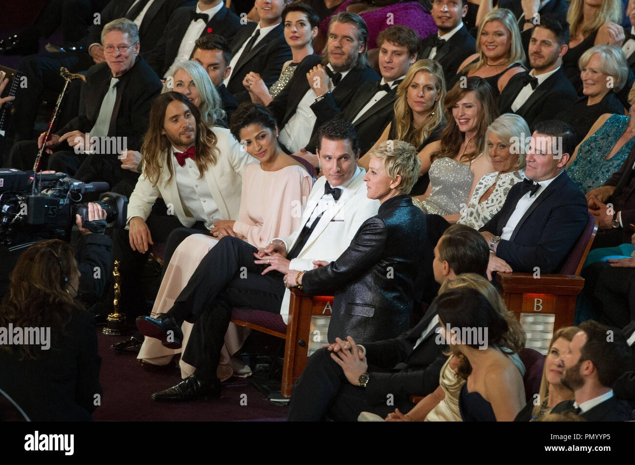 Oscar Winner Jared Leto, Camila Alves, and Oscar Winner Matthew McConaughey observe Ellen Degeneres during the live ABC Telecast of The Oscars® from the Dolby® Theater in Hollywood, CA Sunday, March 2, 2014.  File Reference # 32268 588  For Editorial Use Only -  All Rights Reserved Stock Photo