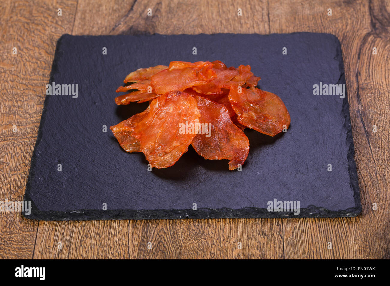Dry chicken meat over wooden Stock Photo Alamy