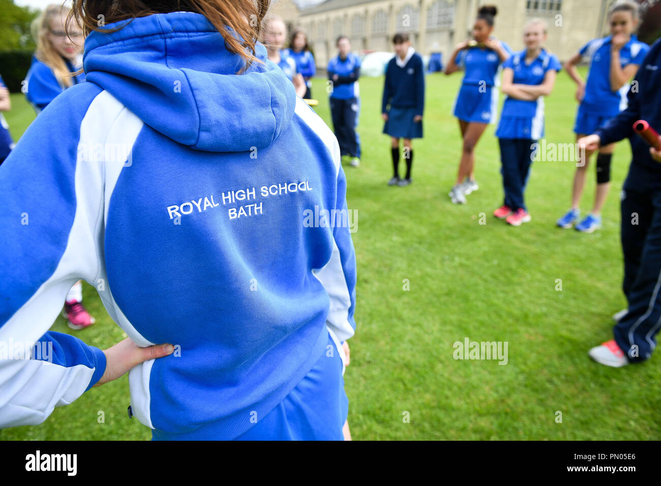 Students during a Physical Education (PE) lesson on the school playing field at Royal High School Bath, which is a day and boarding school for girls aged 3-18 and also part of The Girls' Day School Trust, the leading network of independent girls' schools in the UK. Stock Photo