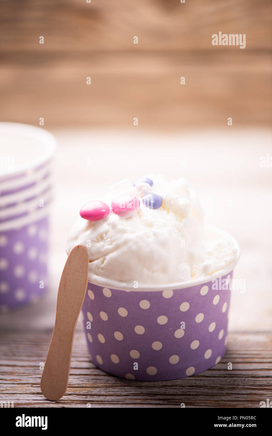 Vanilla ice cream with smarties on a table Stock Photo - Alamy