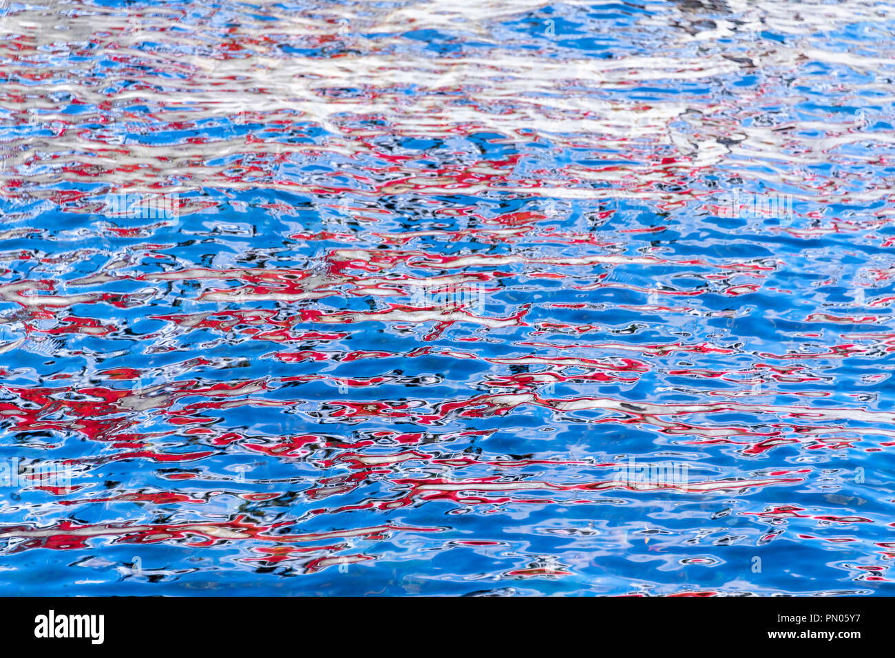 Colourful reflections in water in Stavanger, Norway. Ideal for a background image. Stock Photo