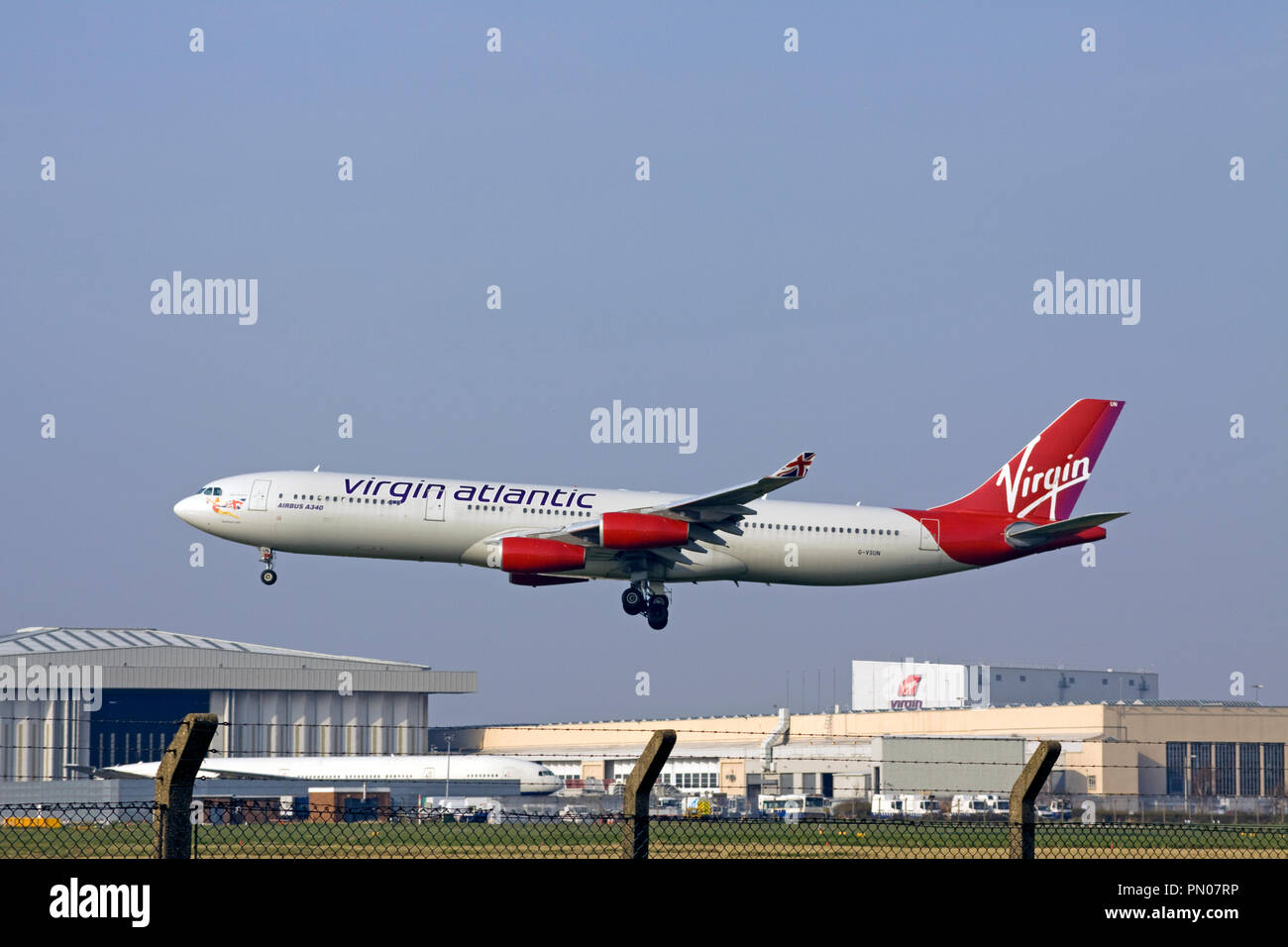 Virgin Atlantic Airways Airbus A340-313 aircraft landing at London Heathrow airport. Stock Photo
