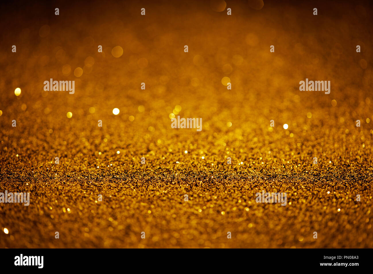 beautiful holiday background with golden glitter Stock Photo - Alamy